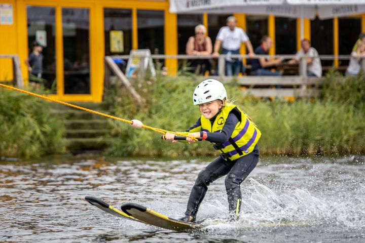 Girls driving water skiing